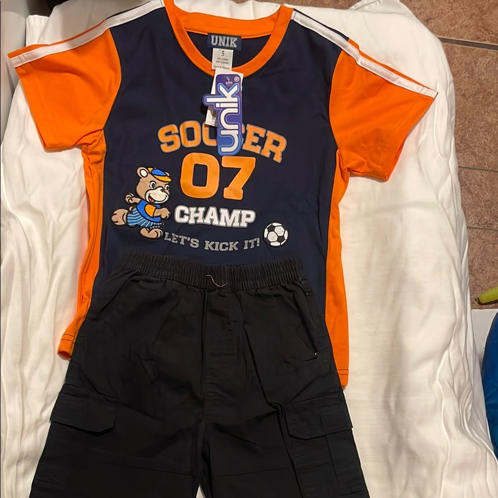 UNIK Kids Soccer Champ Orange and Black T-Shirt